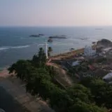 aerial view of city near sea during daytime