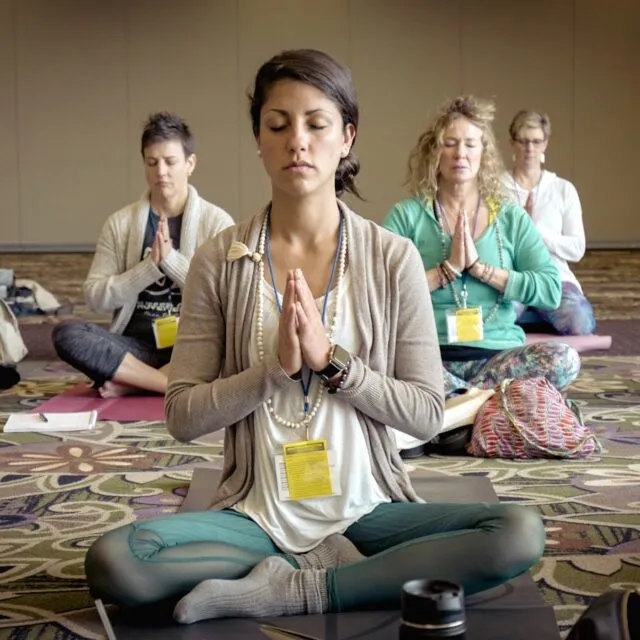 group of people doing yoga